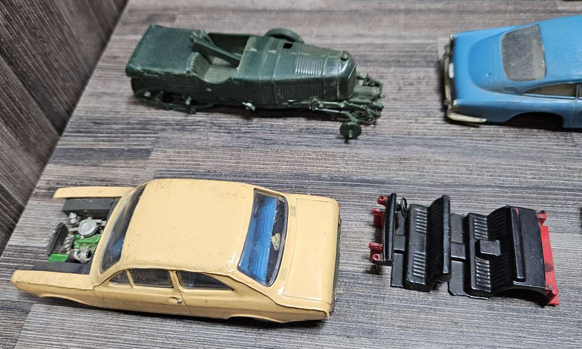 Vintage toy car parts as pictured