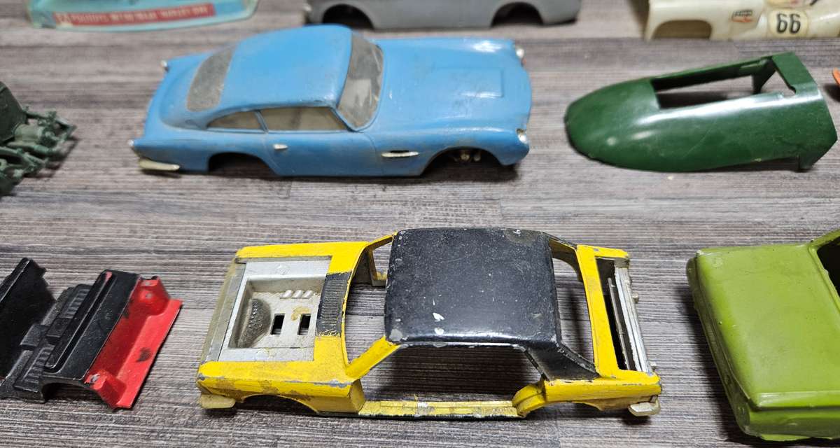 Vintage toy car parts as pictured