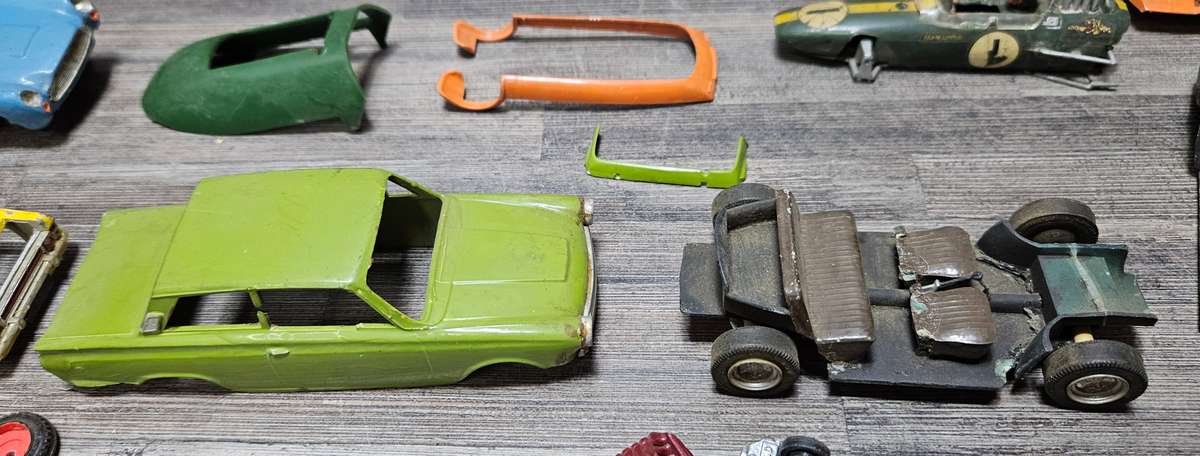 Vintage toy car parts as pictured