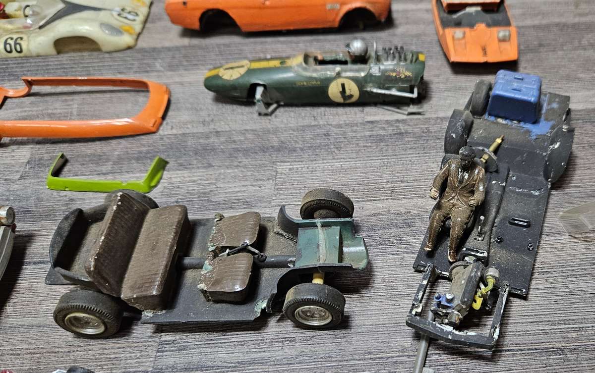 Vintage toy car parts as pictured