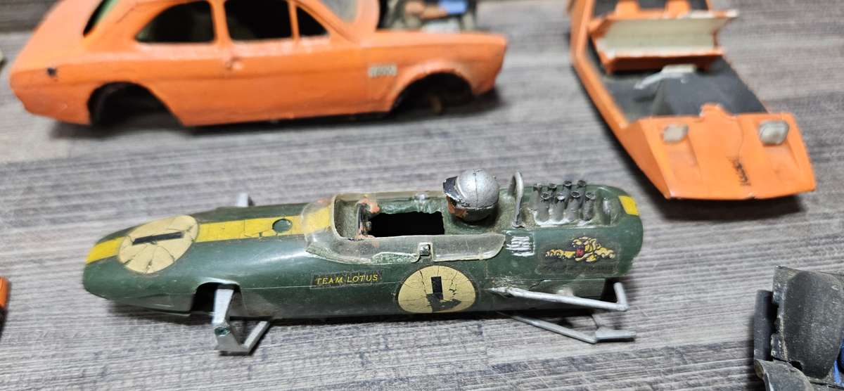 Vintage toy car parts as pictured