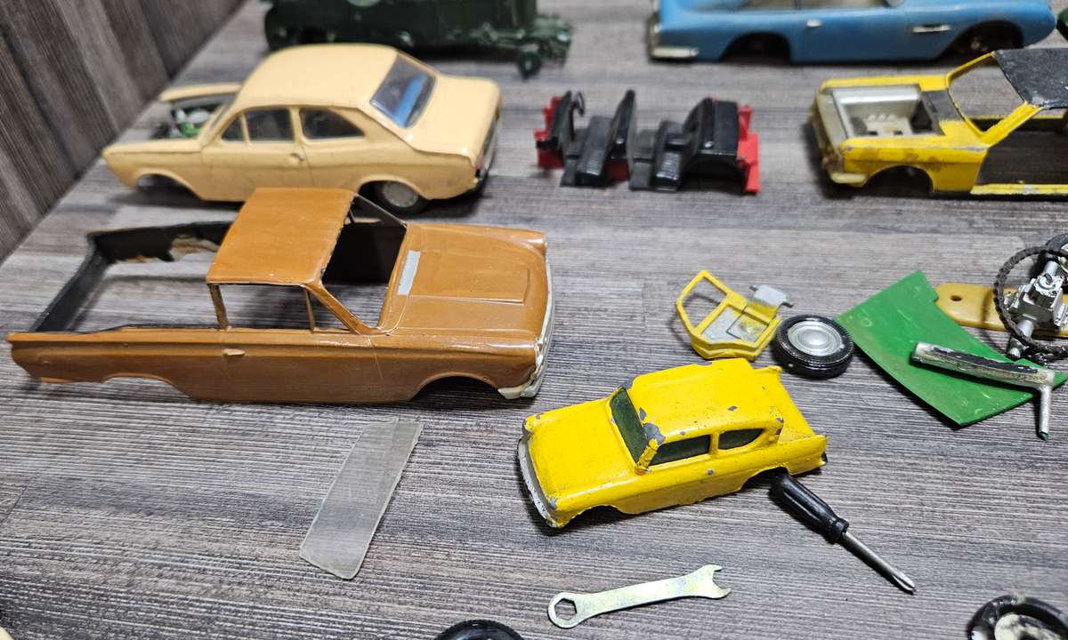 Vintage toy car parts as pictured