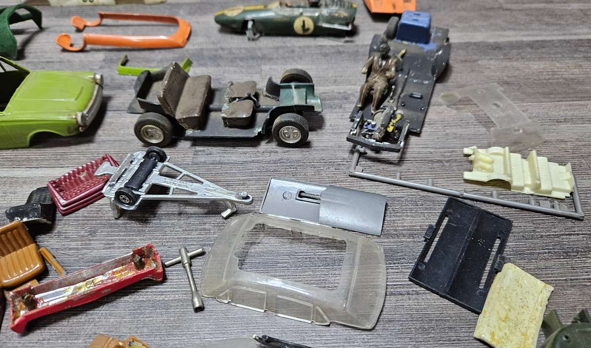 Vintage toy car parts as pictured