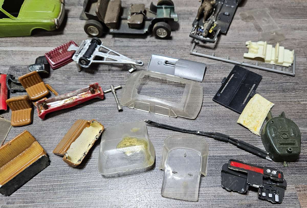 Vintage toy car parts as pictured