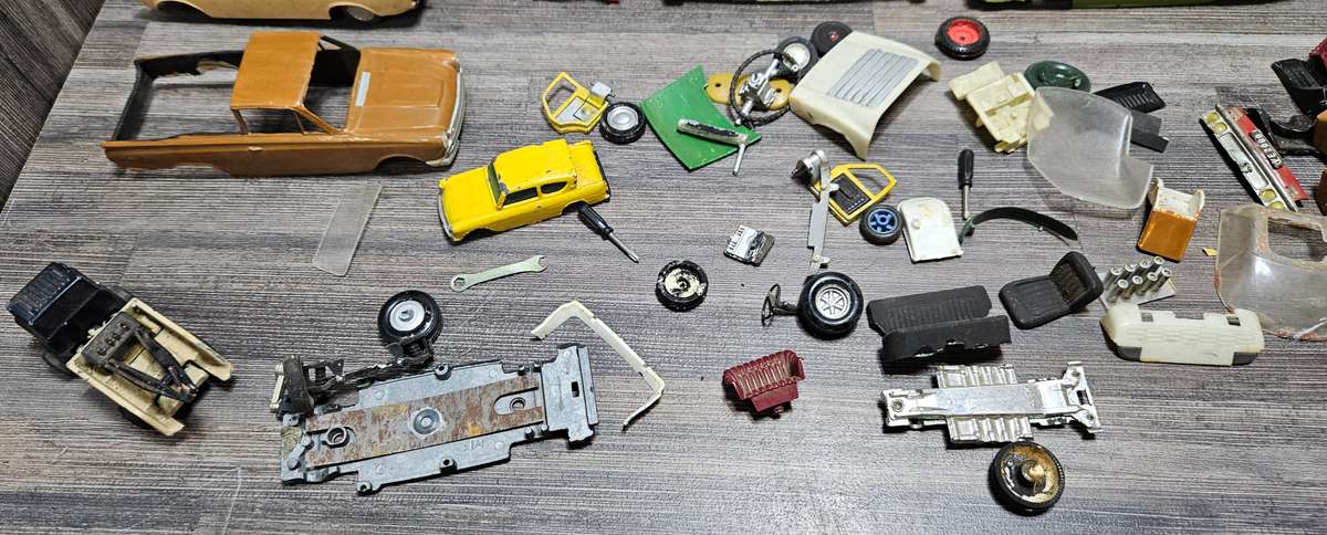 Vintage toy car parts as pictured