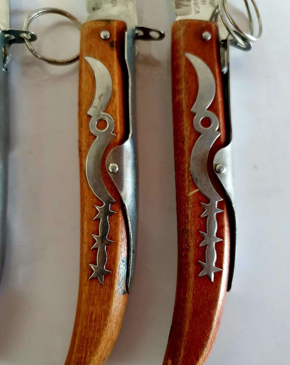 7 X VINTAGE OKAPI FOLDING KNIFES. 5 X 23CM, 1X 21CM, 1 X 18CM.