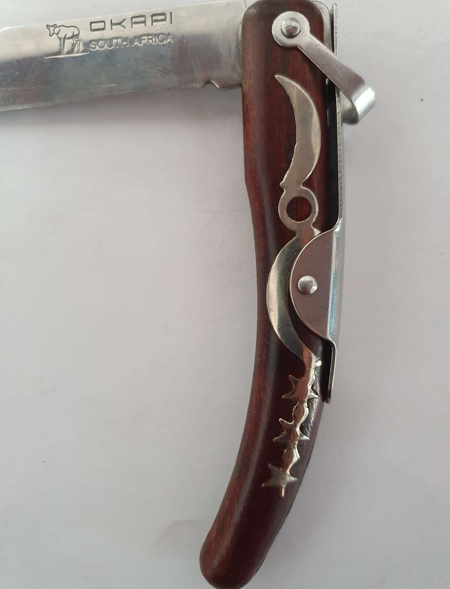 ORIGINAL OKAPI FOLDING KNIFE. ROSEWOOD. VERY GOOD CONDITION.