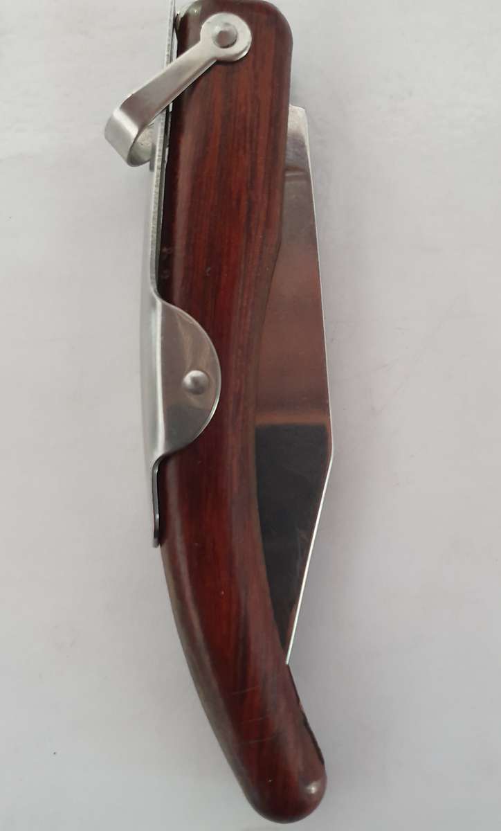 ORIGINAL OKAPI FOLDING KNIFE. ROSEWOOD. VERY GOOD CONDITION.