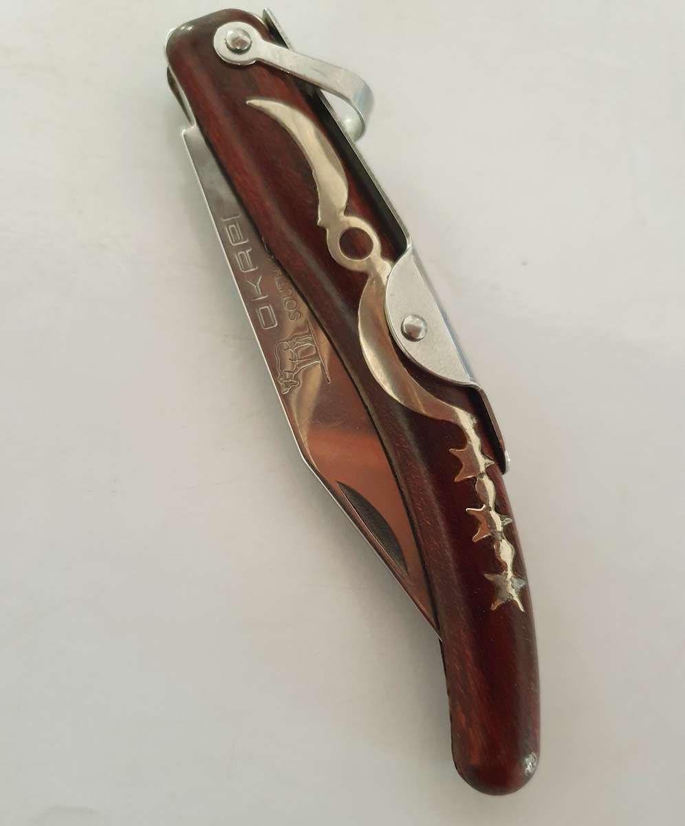 ORIGINAL OKAPI FOLDING KNIFE. ROSEWOOD. VERY GOOD CONDITION.