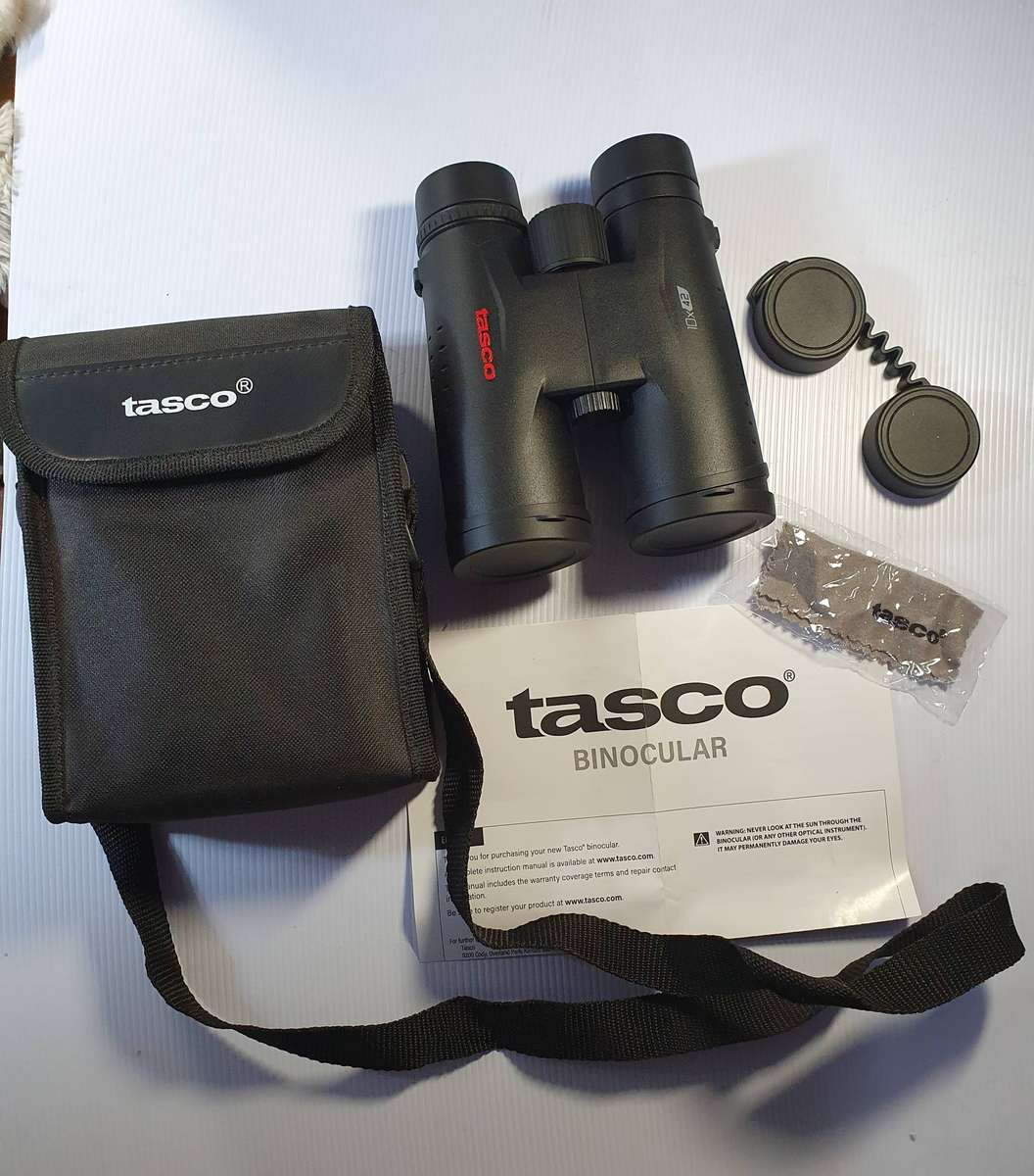 TASCO ES 10X42 BINOCULARS . AS GOOD AS NEW.