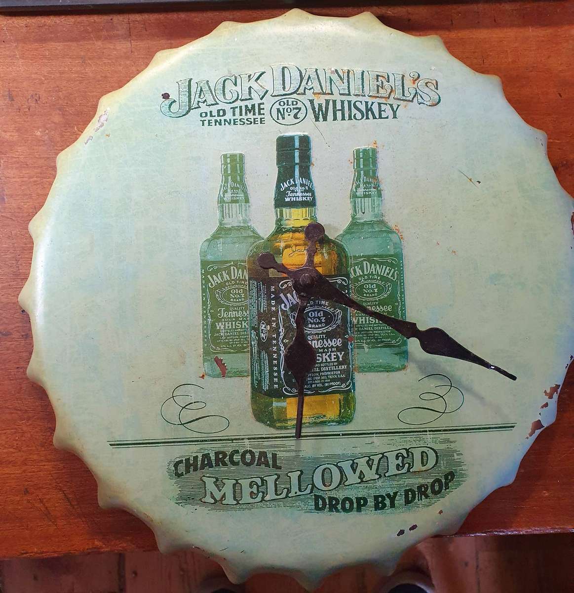 VINTAGEJACK DANIELS   HUGE EMBOSSED METAL BOTTLE LID SHAPE WATCH. 360mm DIA.