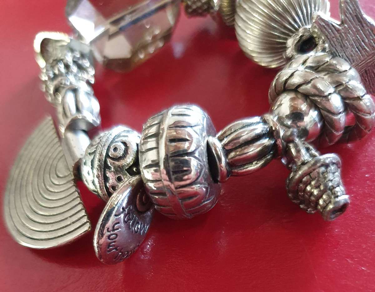 VINTAGE HIGH END METAL BRACELET WITH CHARMS. STUNNING DETAIL.