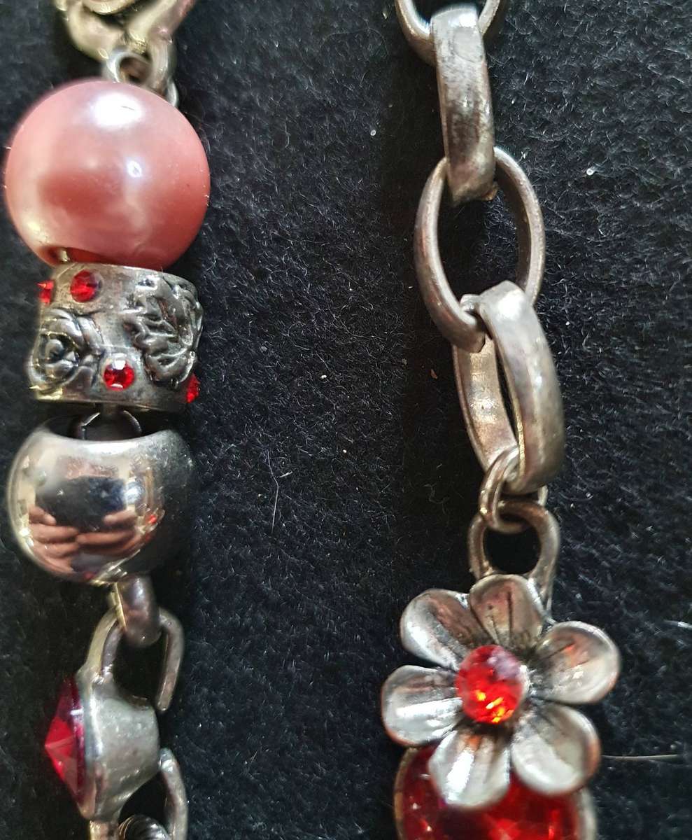 VINTAGE HIGH END METAL AND GLASS  NECKLACE .