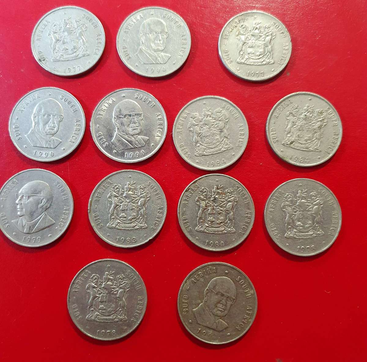 13 X ONE RAND SA COINS. SOME EXCEPTIONAL CONDITION. VARIOUS DATES. ONE BID FOR ALL.
