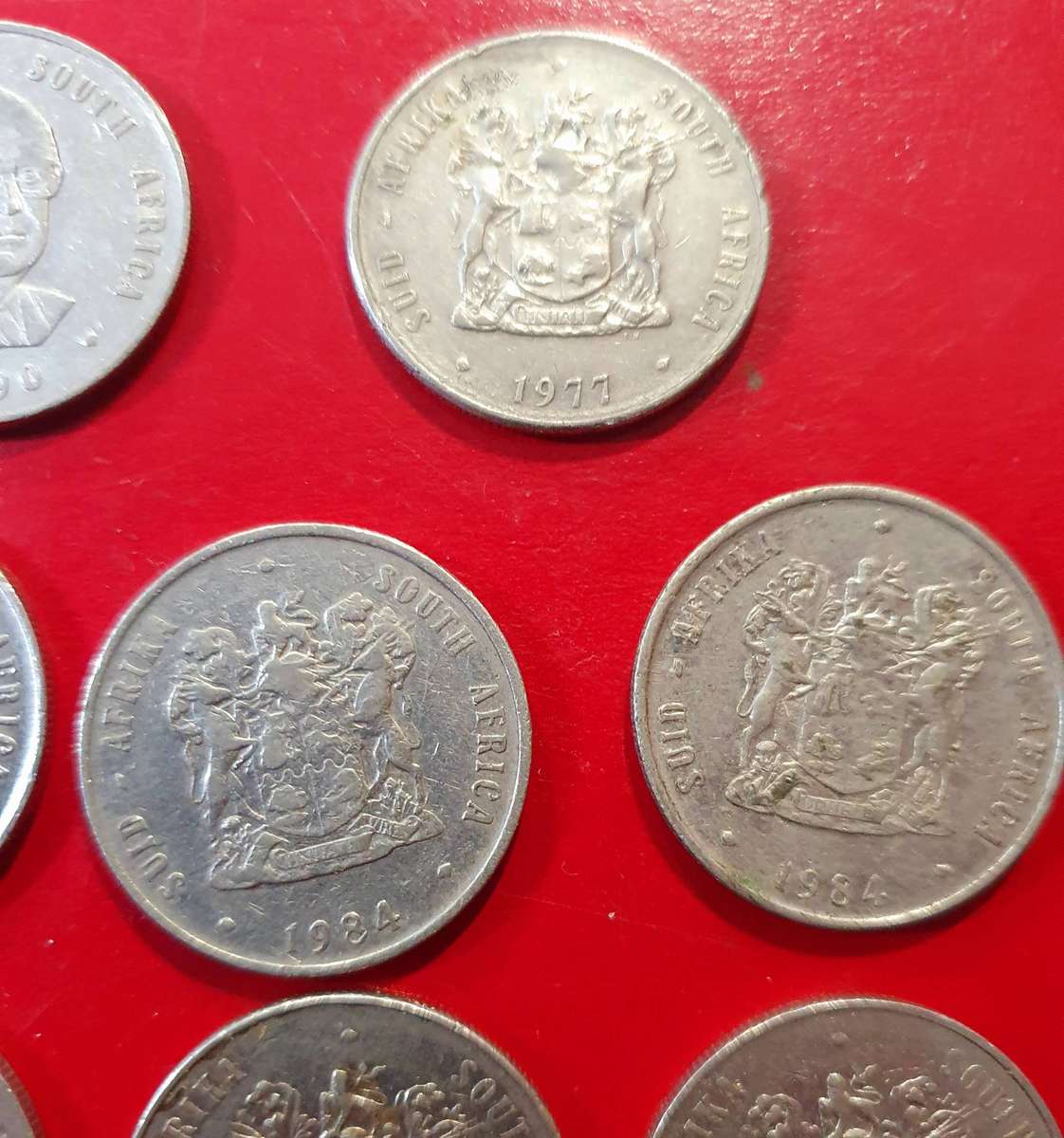 13 X ONE RAND SA COINS. SOME EXCEPTIONAL CONDITION. VARIOUS DATES. ONE BID FOR ALL.