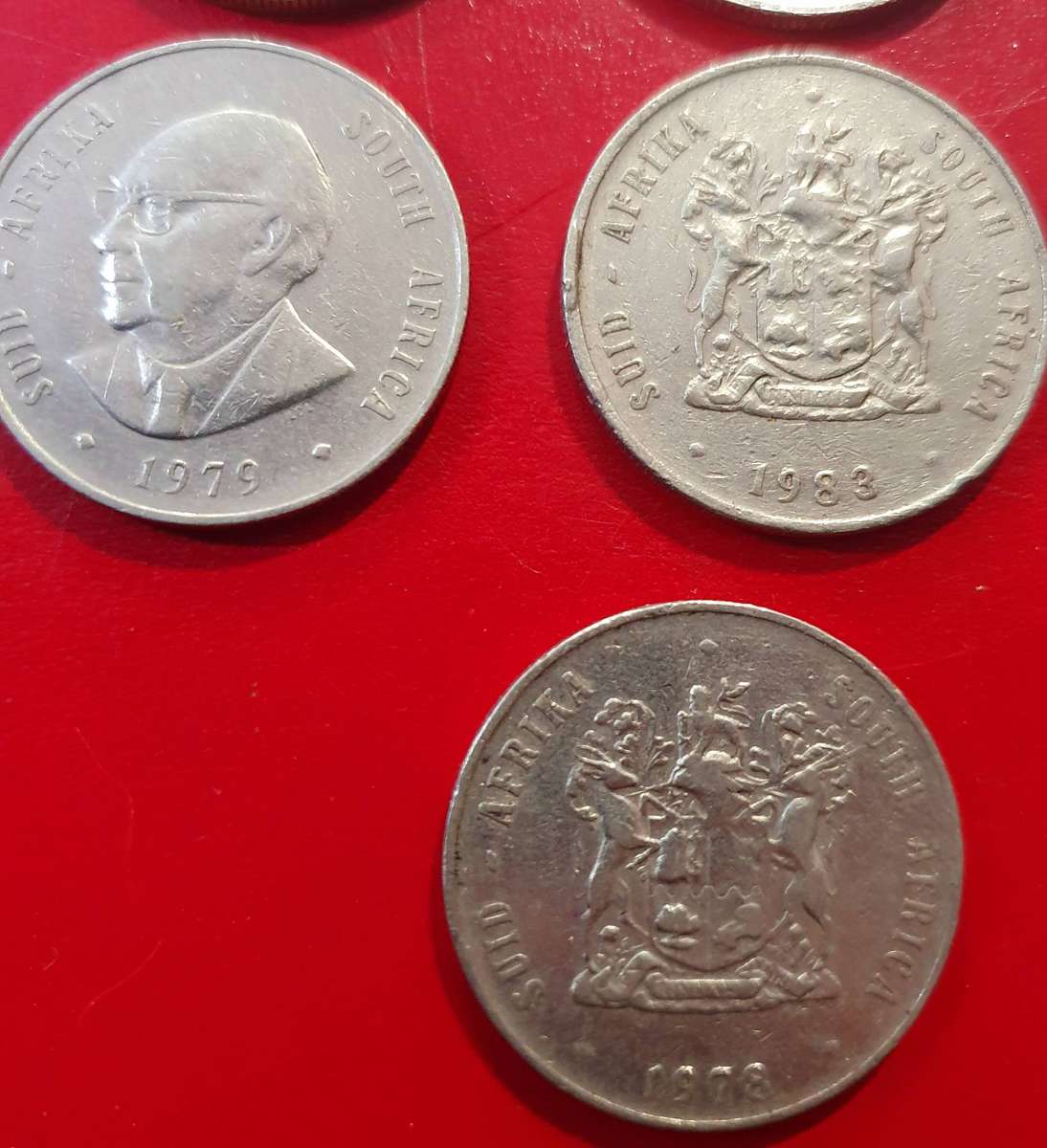 13 X ONE RAND SA COINS. SOME EXCEPTIONAL CONDITION. VARIOUS DATES. ONE BID FOR ALL.