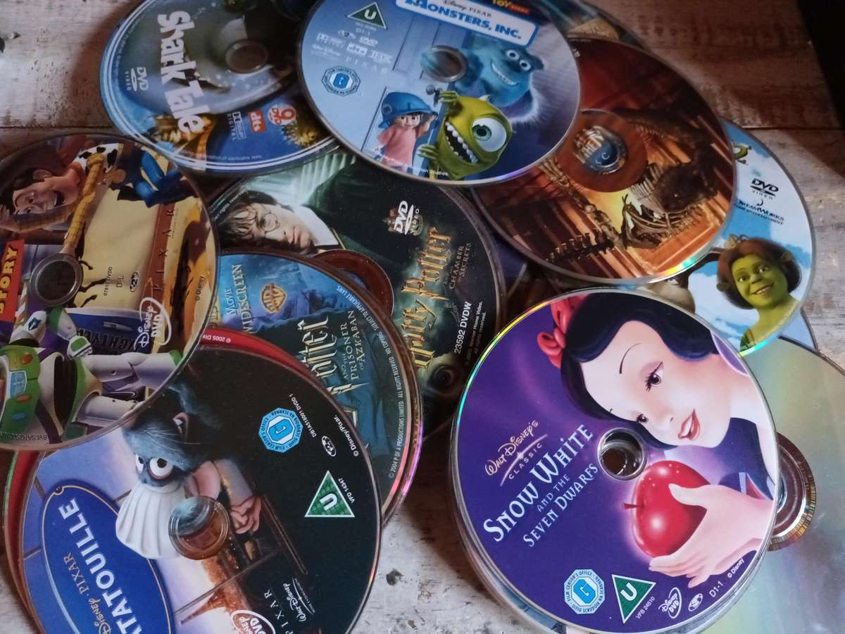Bunch of Colourful Scratched Children DVDs for Project