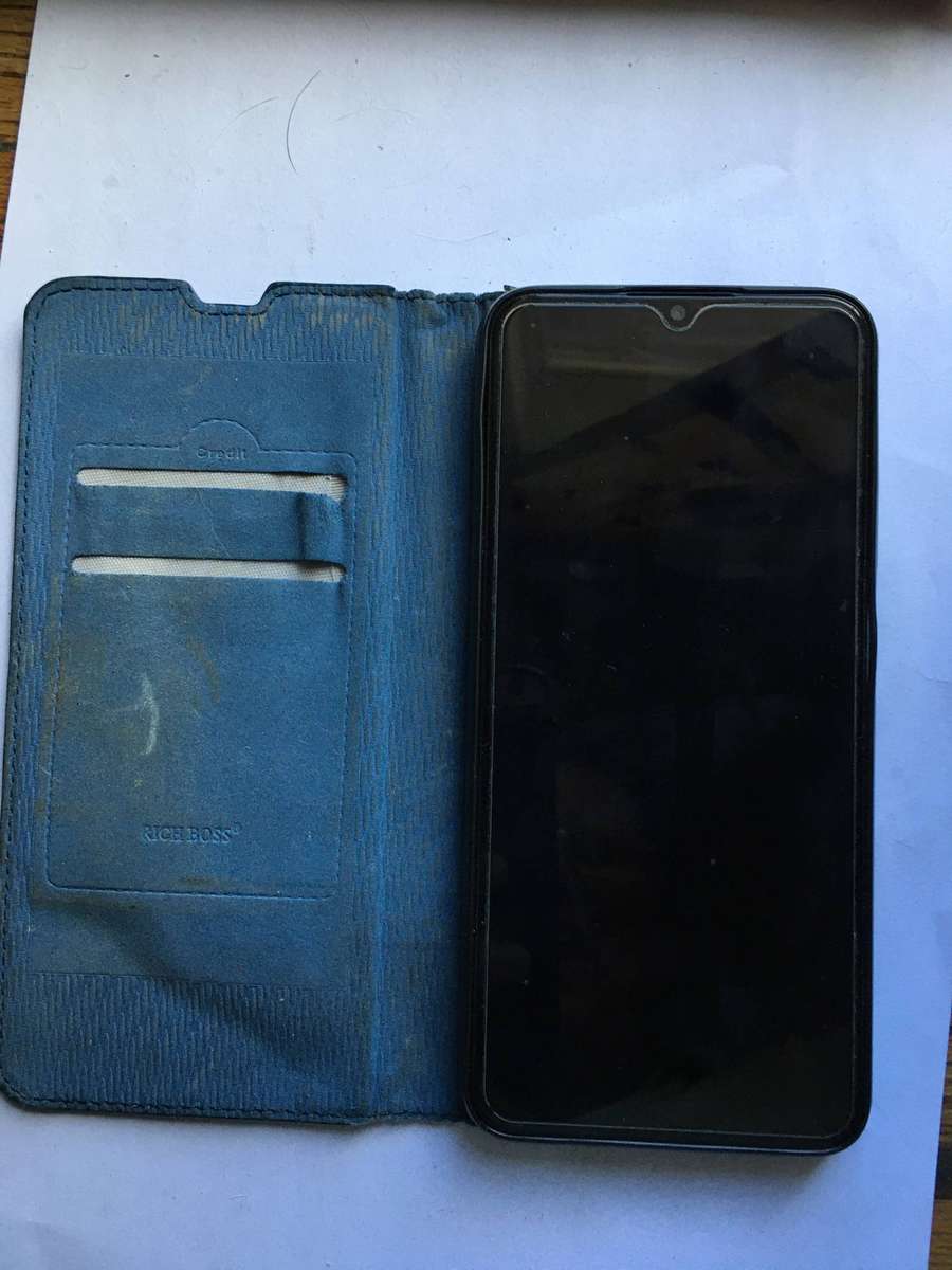 LOVELY SECONDHAND SAMSUNG A03s PHONE WITH CHARGER AND COVER