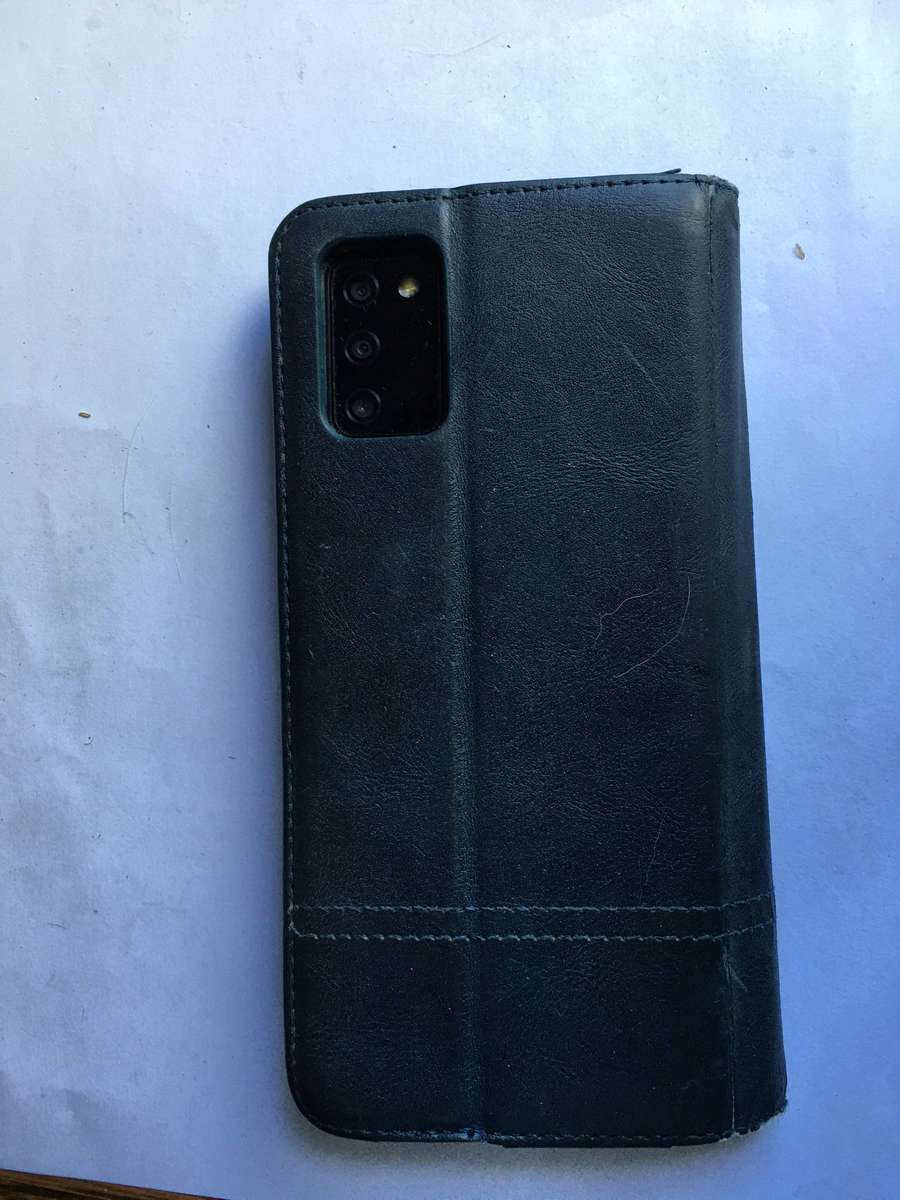 LOVELY SECONDHAND SAMSUNG A03s PHONE WITH CHARGER AND COVER