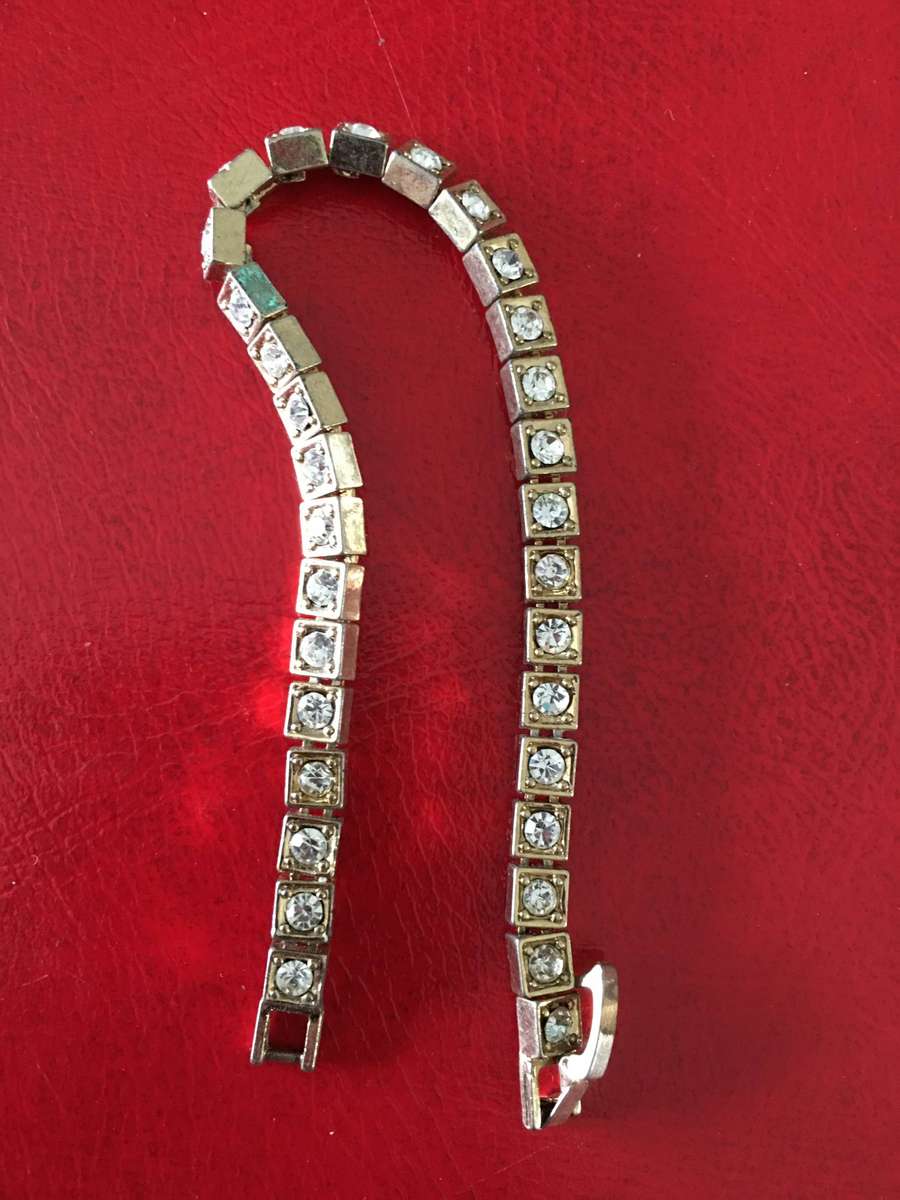 VINTAGE  BRACELET  GOLD TONED WITH STONES MAY BE CRYSTAL NOT SURE