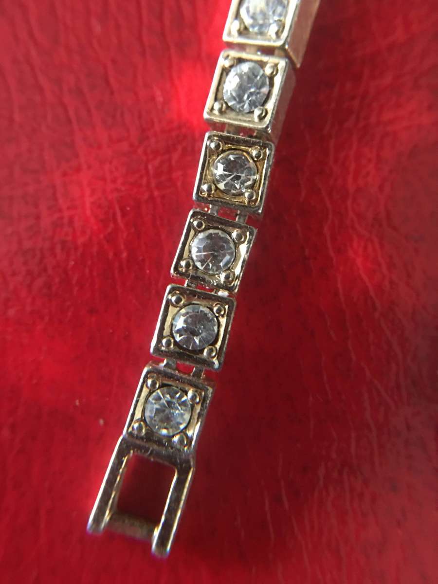 VINTAGE  BRACELET  GOLD TONED WITH STONES MAY BE CRYSTAL NOT SURE
