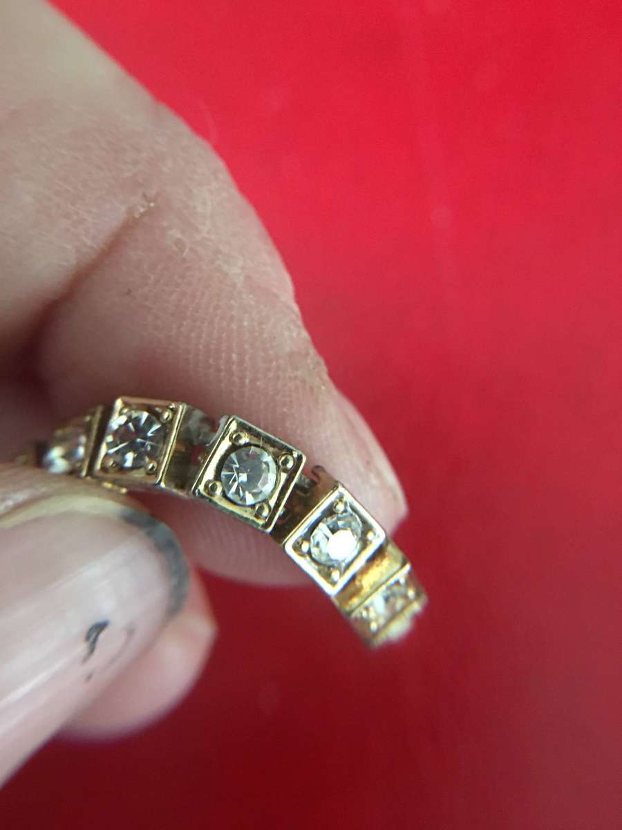 VINTAGE  BRACELET  GOLD TONED WITH STONES MAY BE CRYSTAL NOT SURE