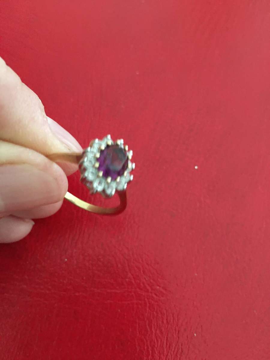LOVELY GOLD RING WITH STONE  HALL MARK PARTIALLY SEEN