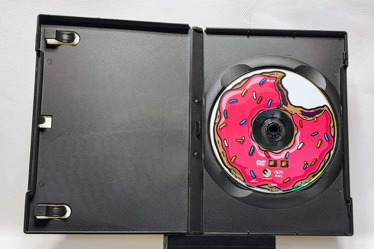 The Simpsons Movie - DVD in plastic case & cardboard sleeve