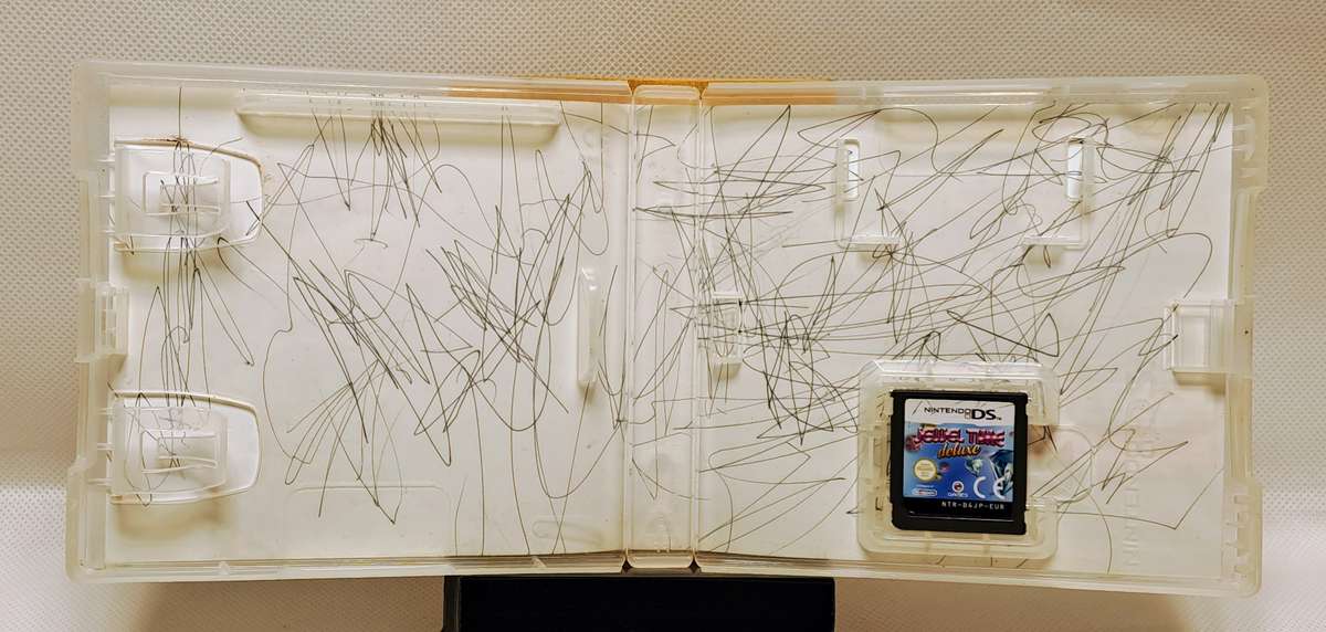 Nintendo DS Lite (Limited Edition Lime Green) handheld console with bundled games