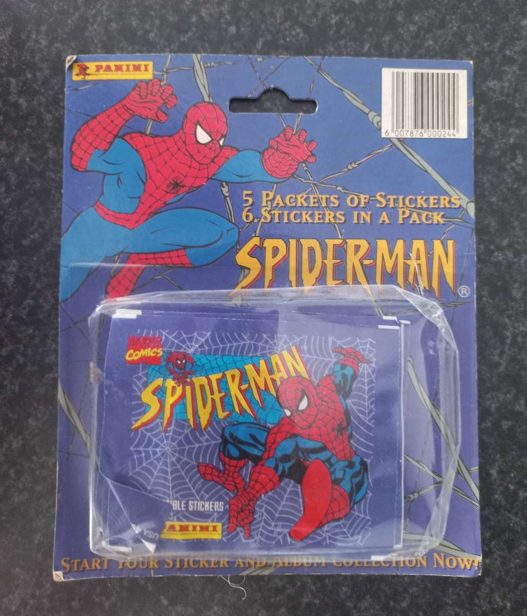 SPIDERMAN COLLCTABLE CARDS AND BOOKIE