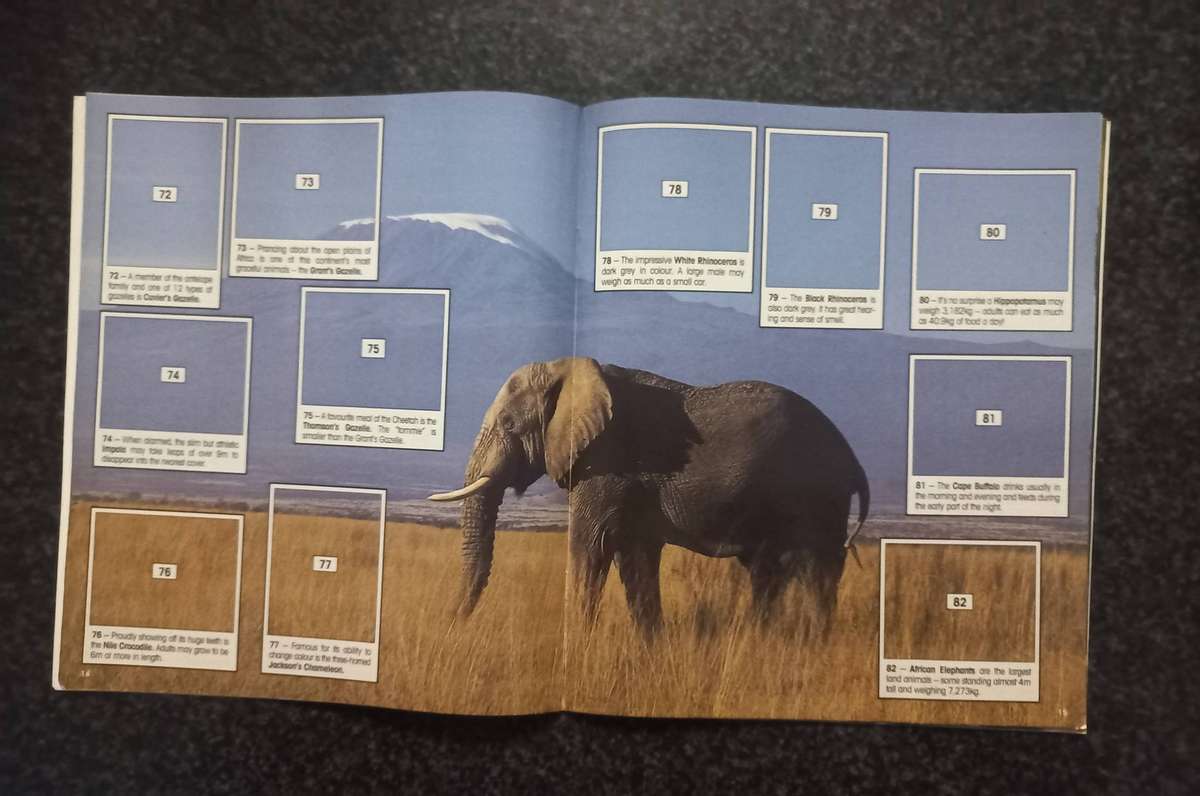 ANIMAL OF THE WORLD COLLECTABLE STICKERS AND BOOKIE