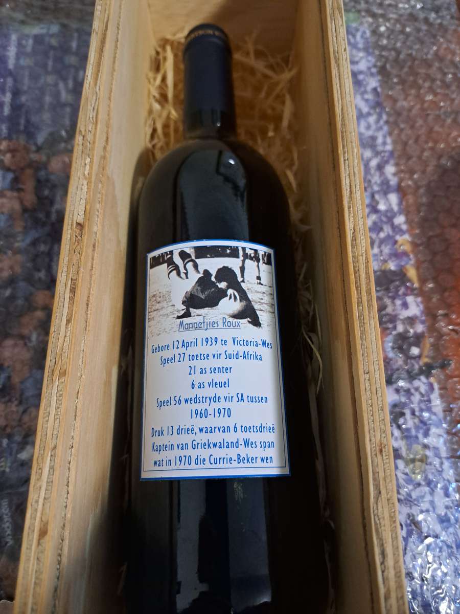 Rugby bottle signed by Mannetjies Roux