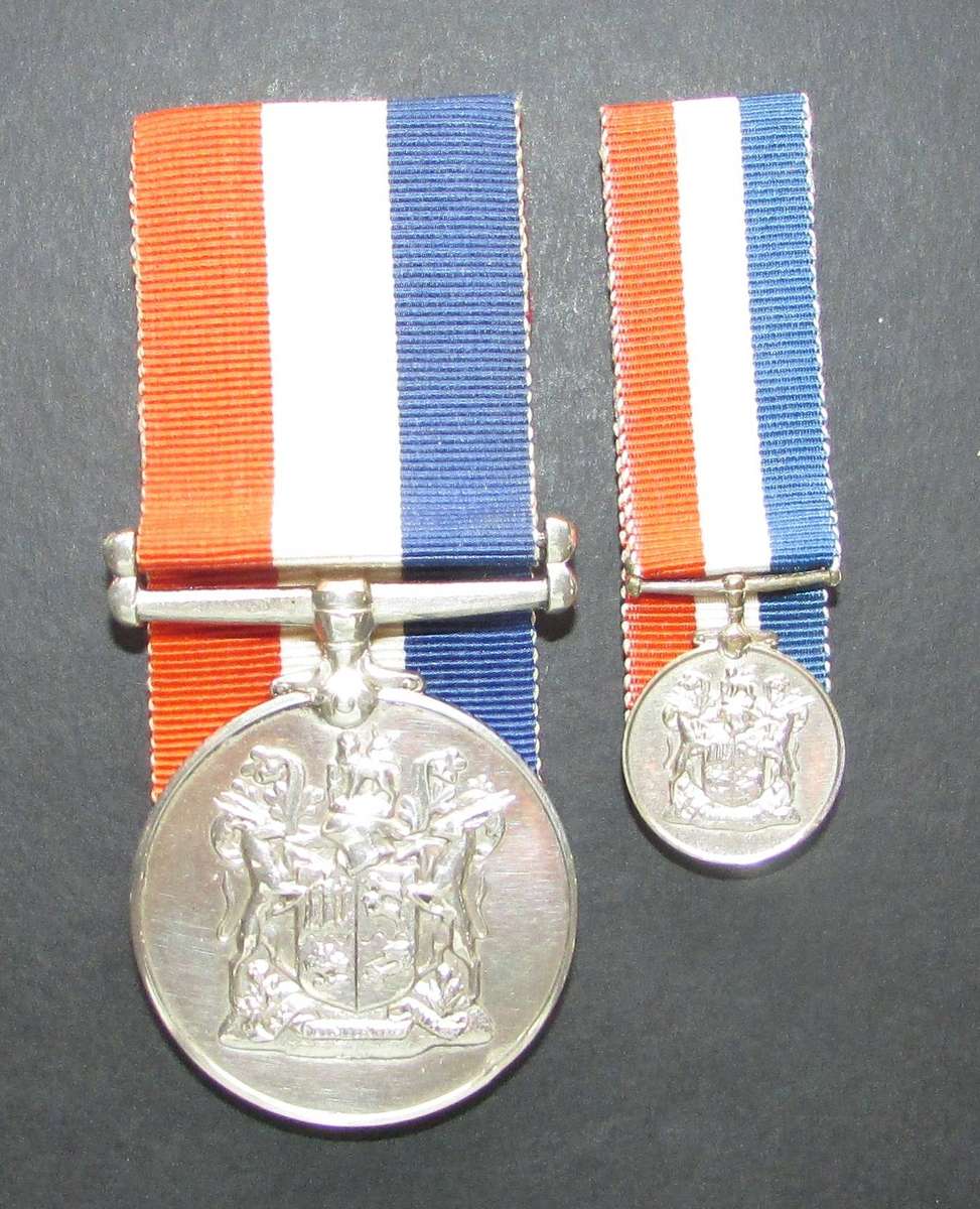 Full Size World War Two Medal for War Services with Miniature ( Sterling Silver ) Not Named