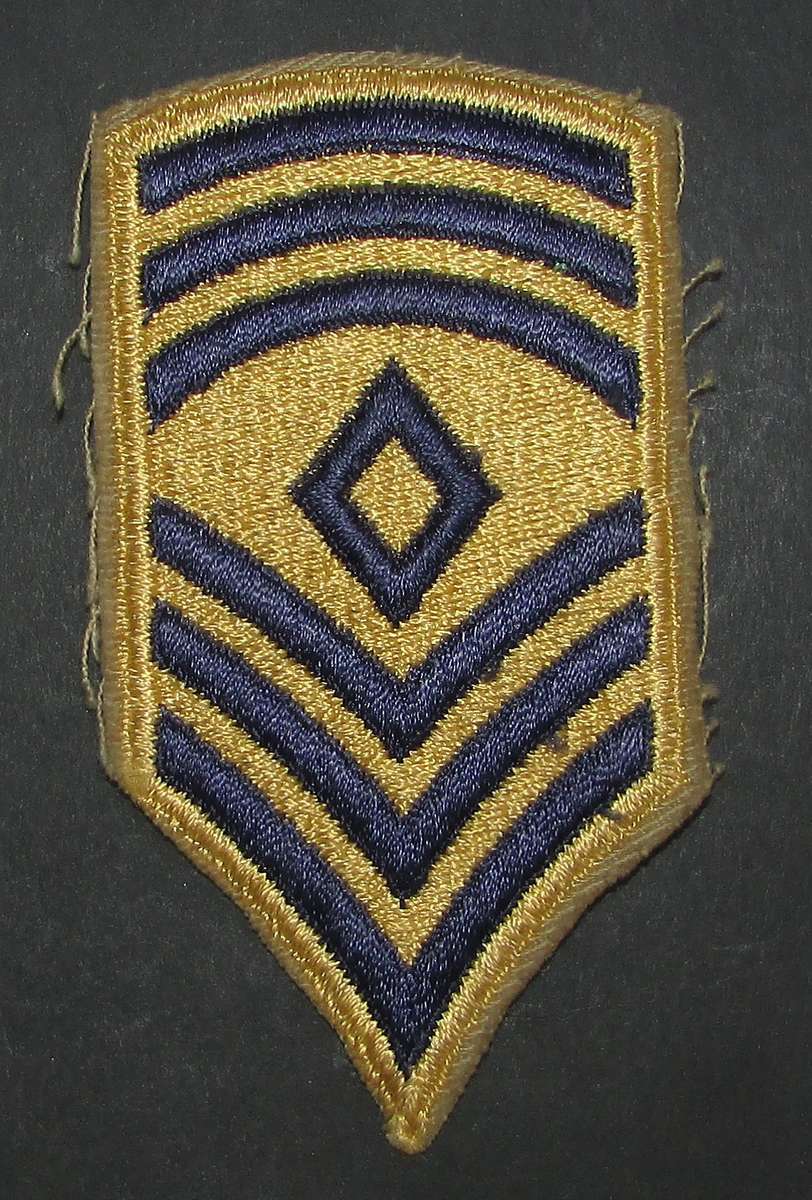 International - Rank Badge