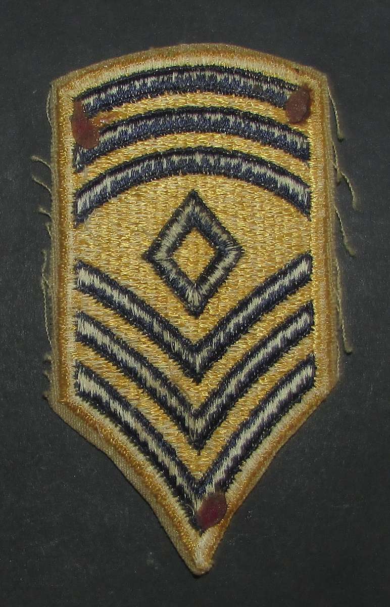 International - Rank Badge