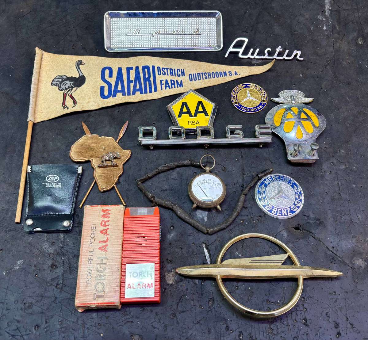 Assorted badges AA, Dodge, Opel, Austin, Mercedes Benz and more