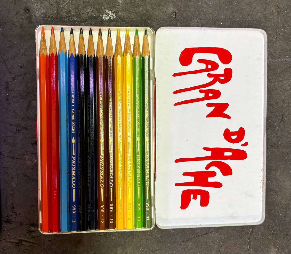 COLOURING  PENCILS AND PAINTING BRUSHES SET IN TIN