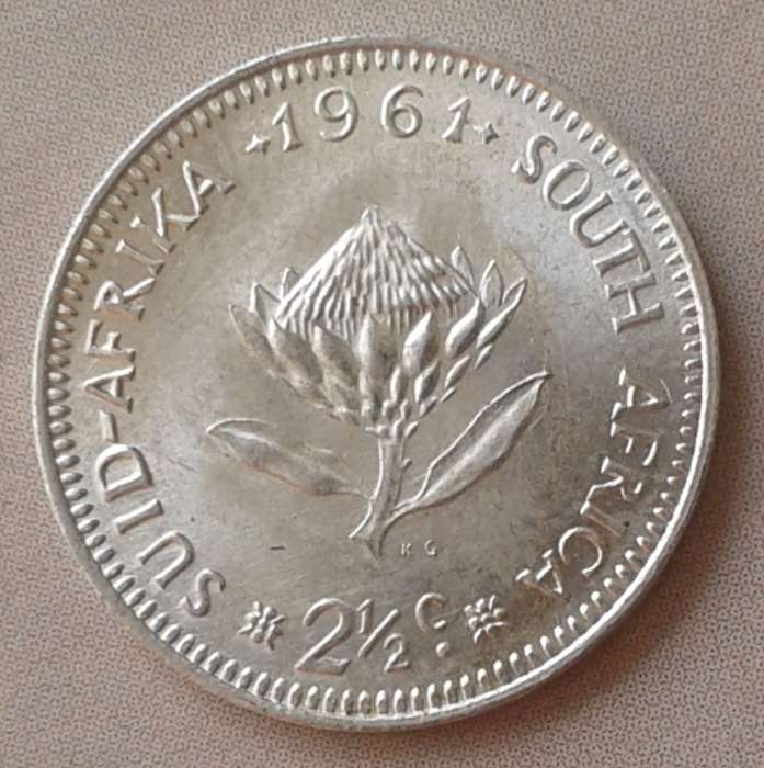 Uncirculated 1961 Republic silver 2 1/2c in coin flip