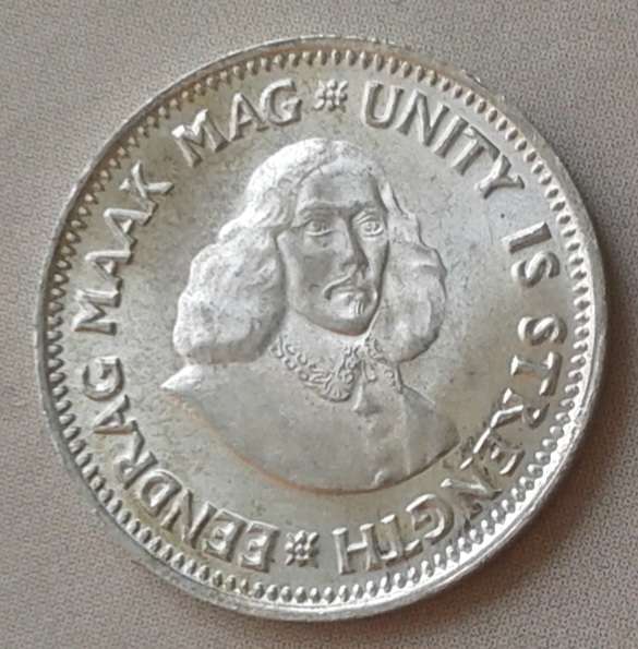 Uncirculated 1961 Republic silver 2 1/2c in coin flip