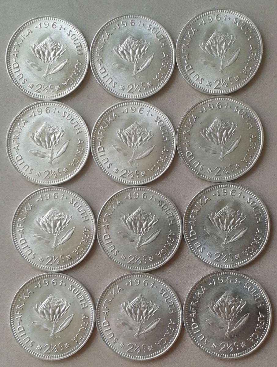 Uncirculated 1961 Republic silver 2 1/2c in coin flip