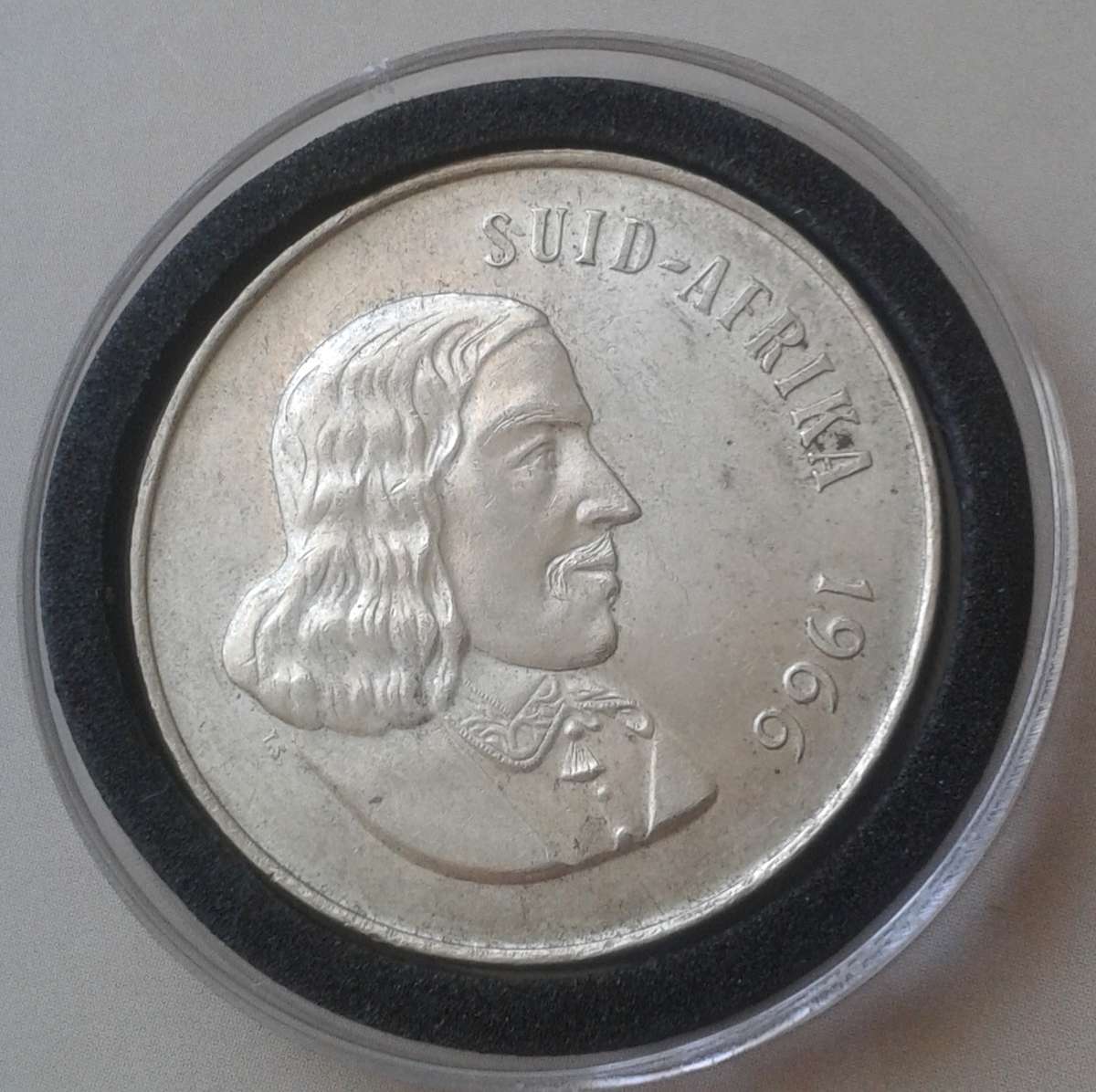 Encapsulated 1966 Republic silver R1 "Tagged Ear"