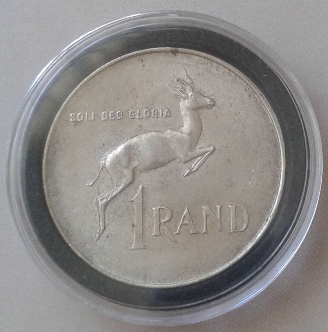 Encapsulated 1966 Republic silver R1 "Tagged Ear"