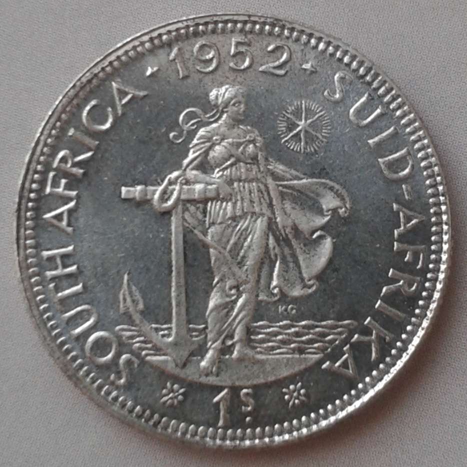 Nice 1952 union proof silver shilling.