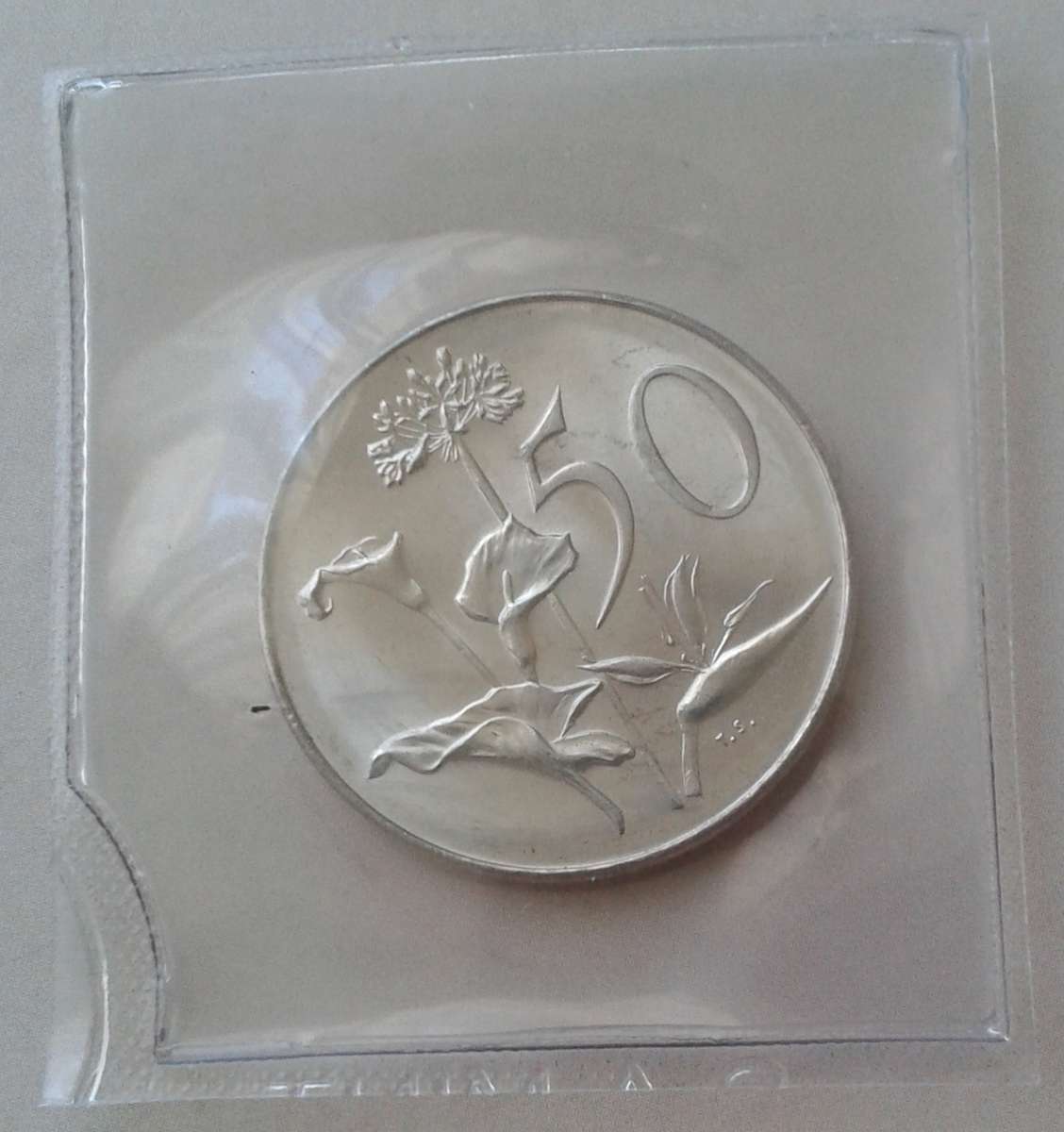 1968 English uncirculated nickel 50c (Pres.Swart)