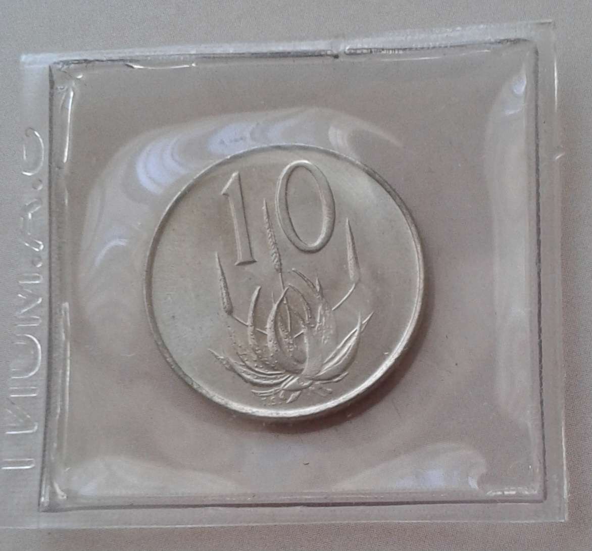 Uncirculated 1967 English nickel 10c (low mintage)