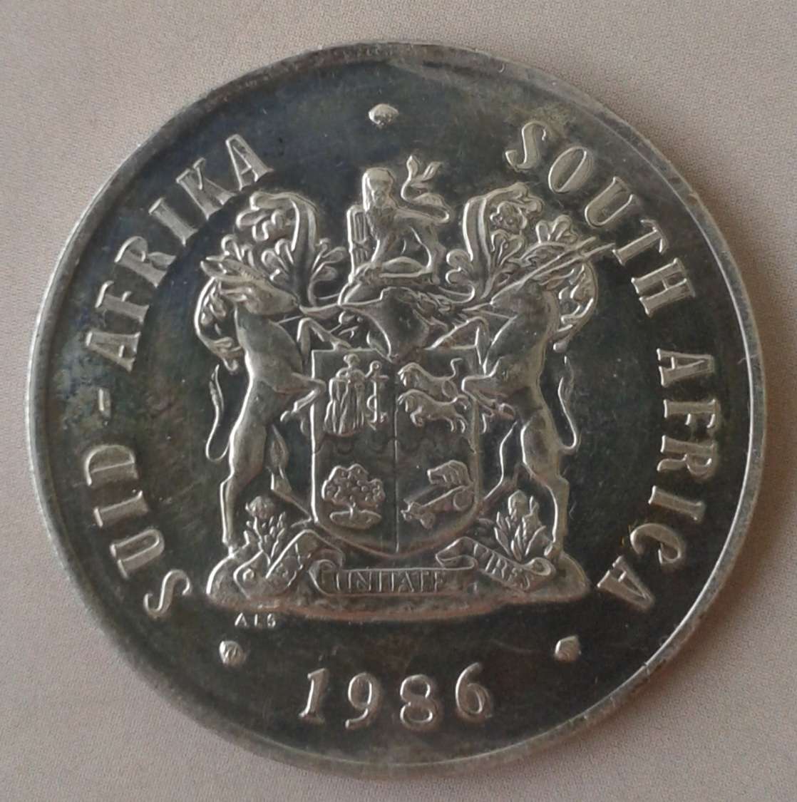 Nice 1986 JHB Mining uncirculated silver R1