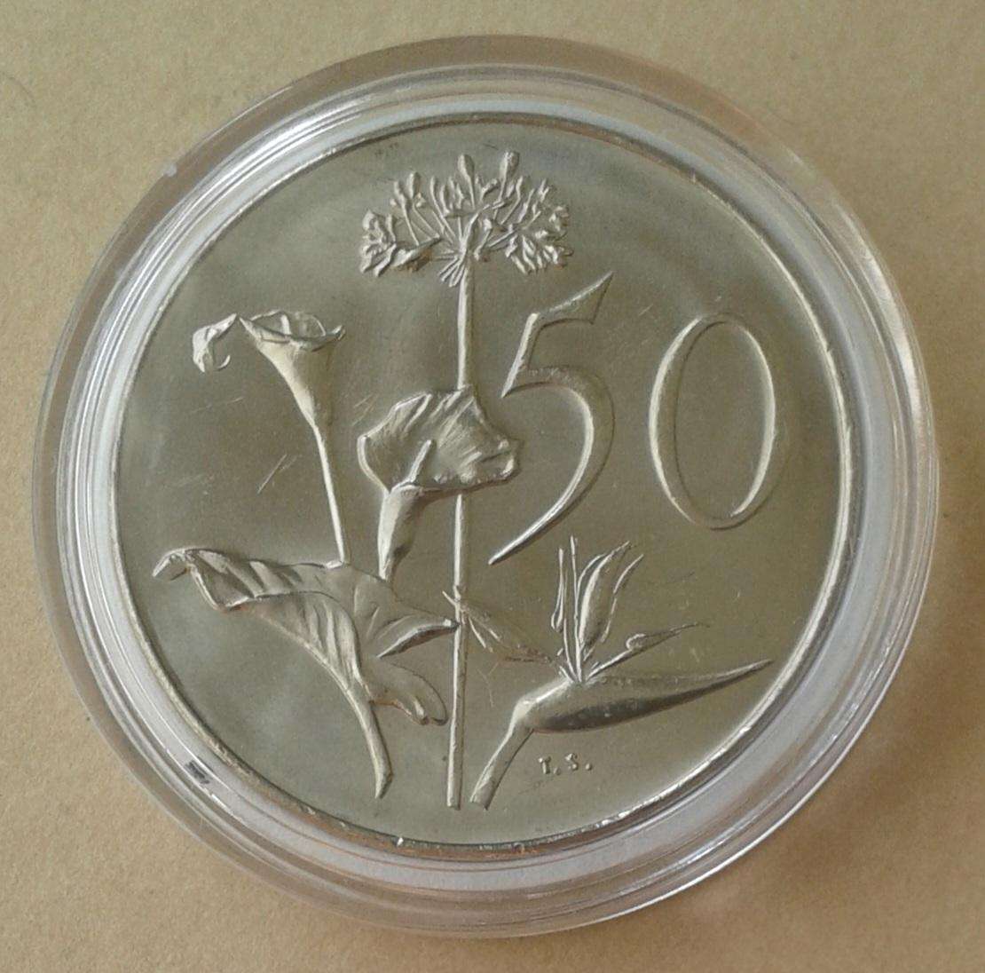 Scarcer 1969 English uncirculated nickel 50c in capsule