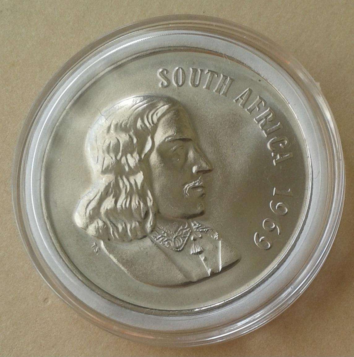 Scarcer 1969 English uncirculated nickel 50c in capsule