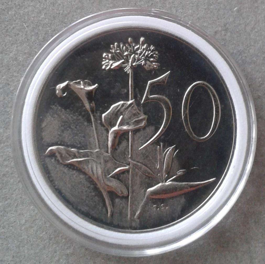 Encapsulated 1967 English proof nickel 50c (mintage: 25000)