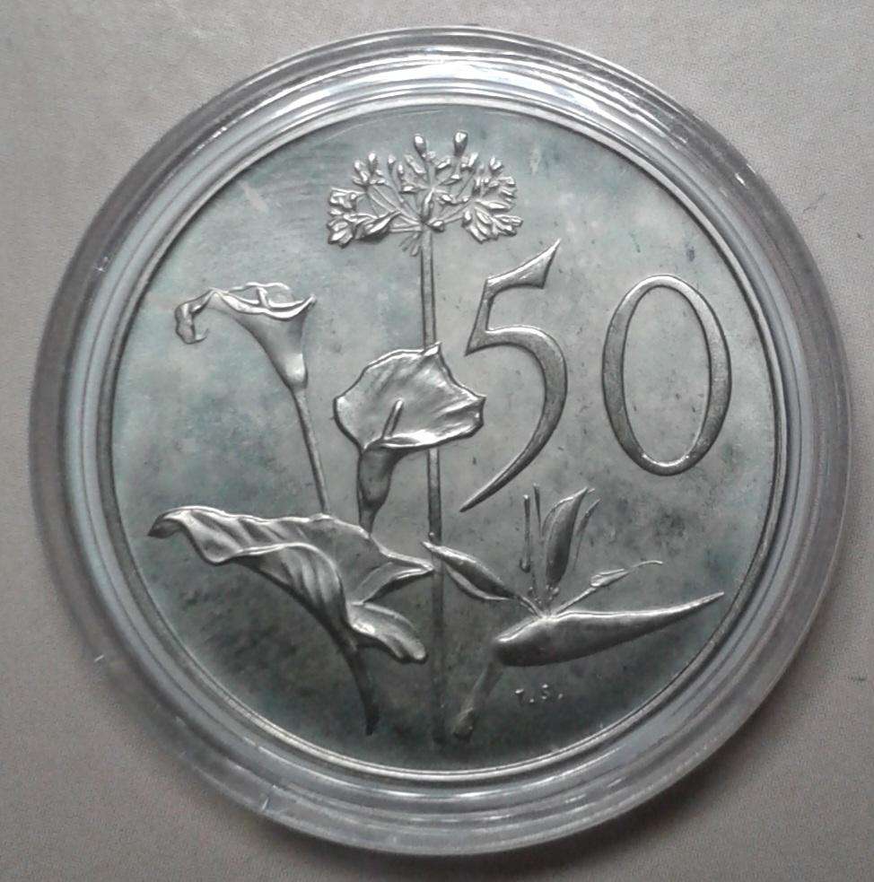 Encapsulated 1966 English proof 50c (mintage: 25000)